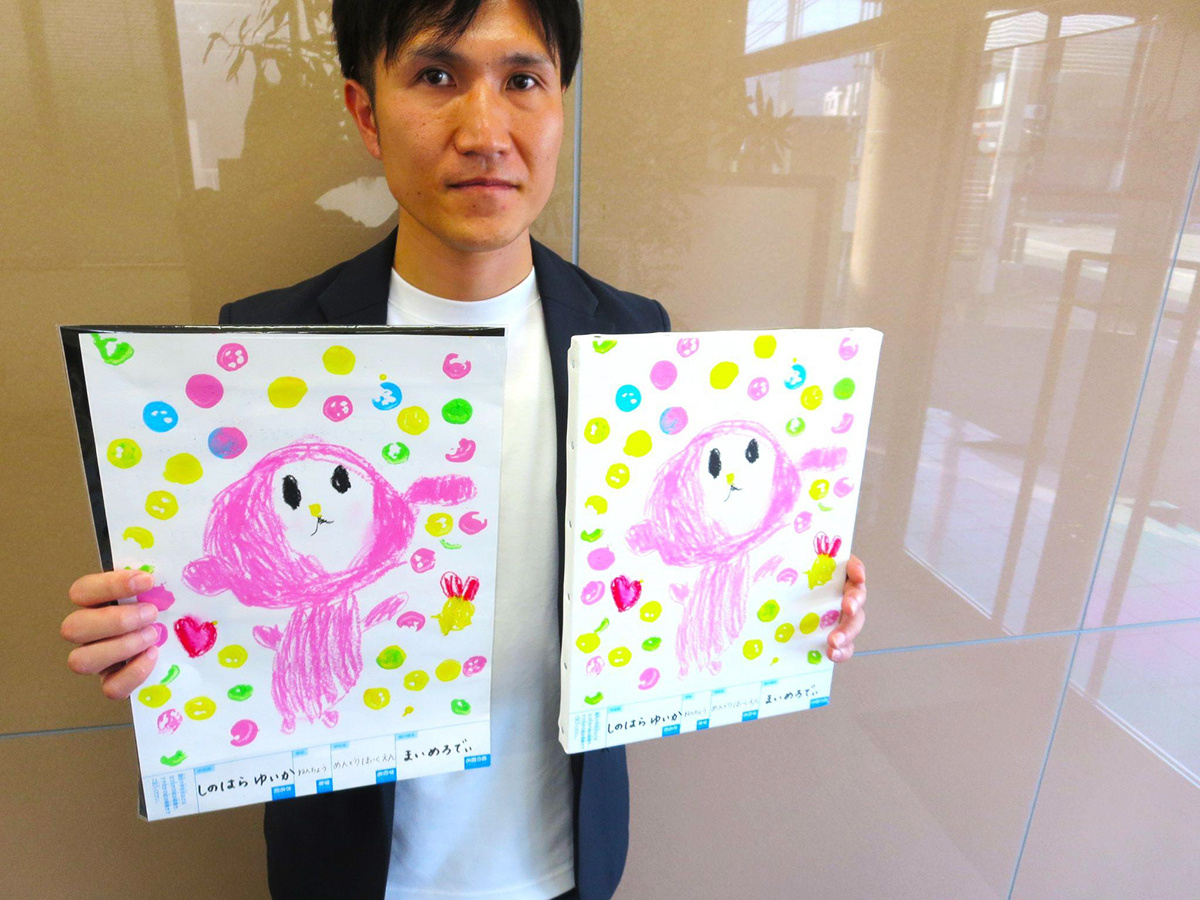 President Shinohara is also exploring new uses for the printer. A sample of his child's drawing reproduced by the printer, showing a crayon is expressed by the thick print function of UV printer.