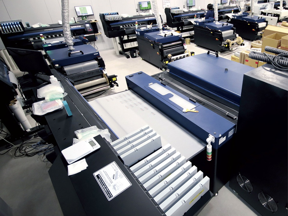 The company now operates a total of seven TxF Series printers: six TxF300-75 units and one wide-format TxF300-1600 unit.
