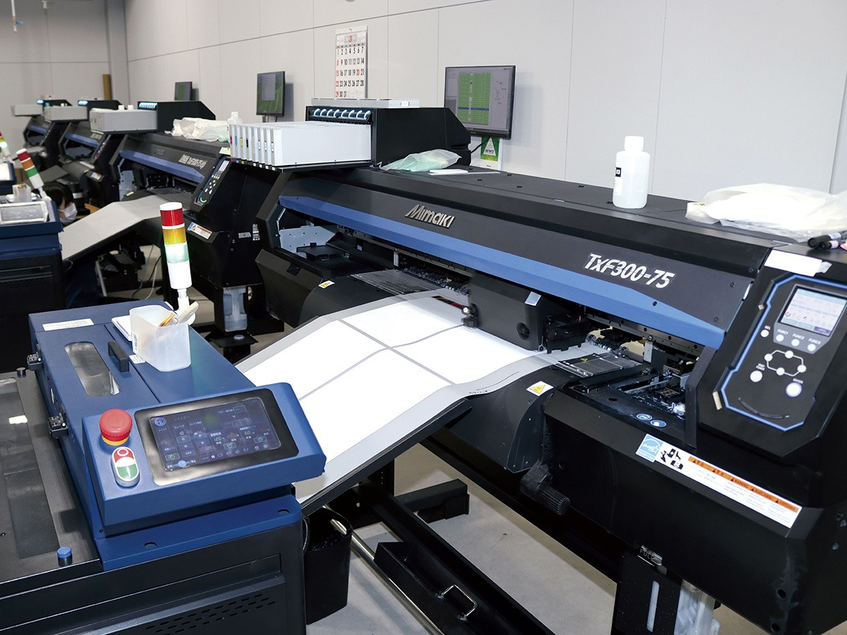 TERUMI ENTERPRISE CO., LTD. has installed six Mimaki TxF300-75 two-head DTF printers and is making full use of them for mass production of T-shirts.